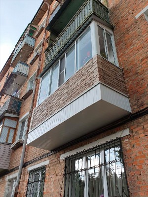 Отделка балкона снаружи