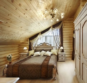 Мансардная спальня в деревянном доме