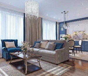 Синий диван в бежевом интерьере гостиной