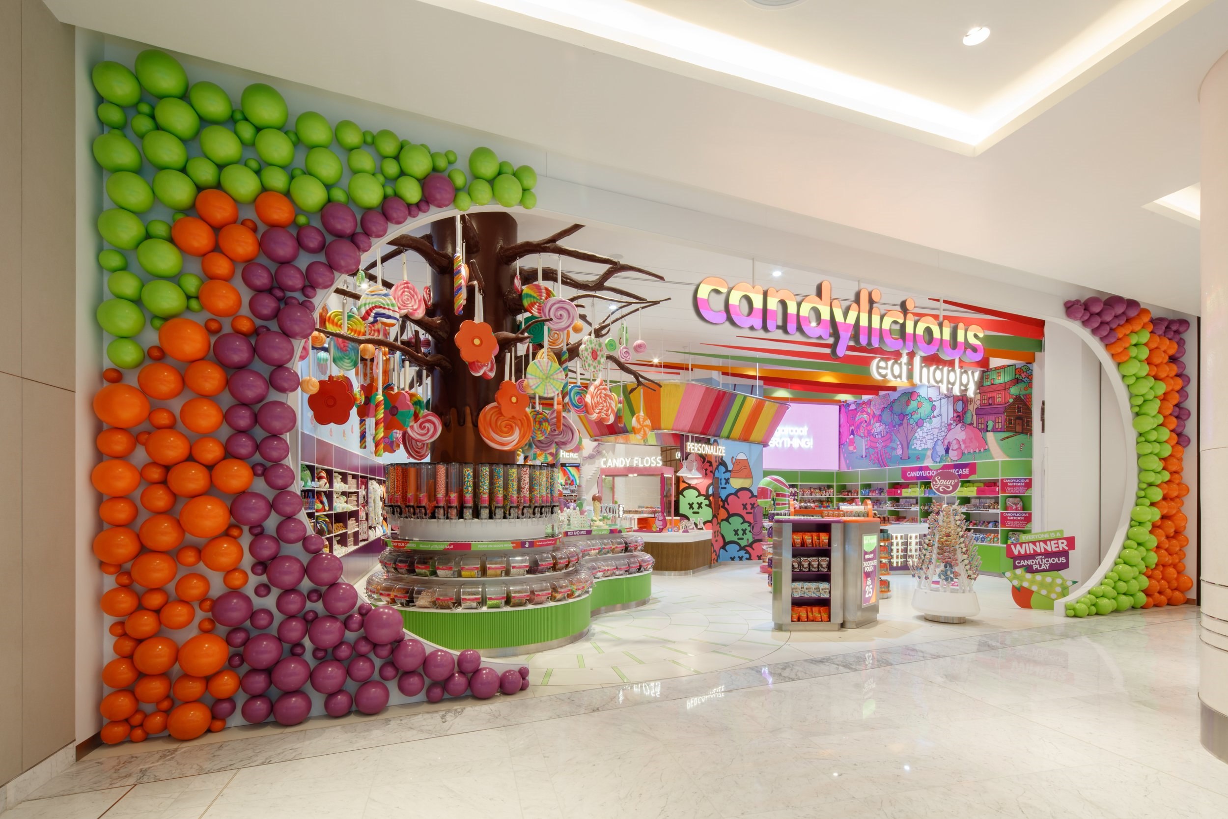 Сласти стор. Дубай Молл Candylicious. Магазин Candylicious Dubai Mall. Дубай Молл магазин сладостей. Магазин сладостей в Дубае Candylicious.