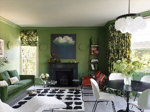 Зеленые стены в интерьере гостиной
